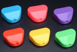 Standard Retainer Box - Assorted Pastel Colors 12/Pk. Plastic with Hinged Lid, 3"W x 2-1/2"L x 1"H. Complete with patient ID stickers.